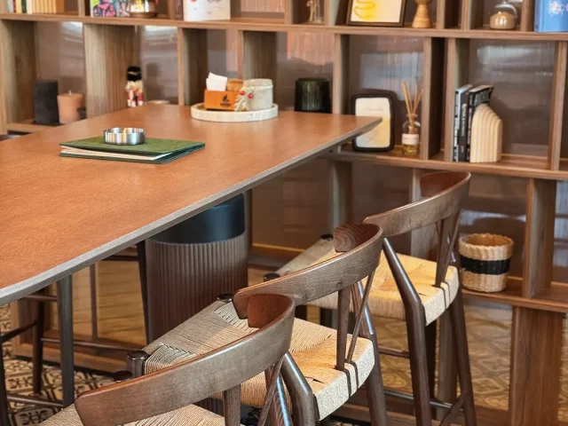 The interior of Kakadu Concept Bar with a bookshelf at Belgrade Waterfront.