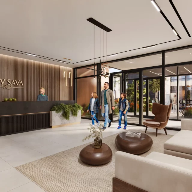 Porodica ulazi u lobi zgrade BW Sava.