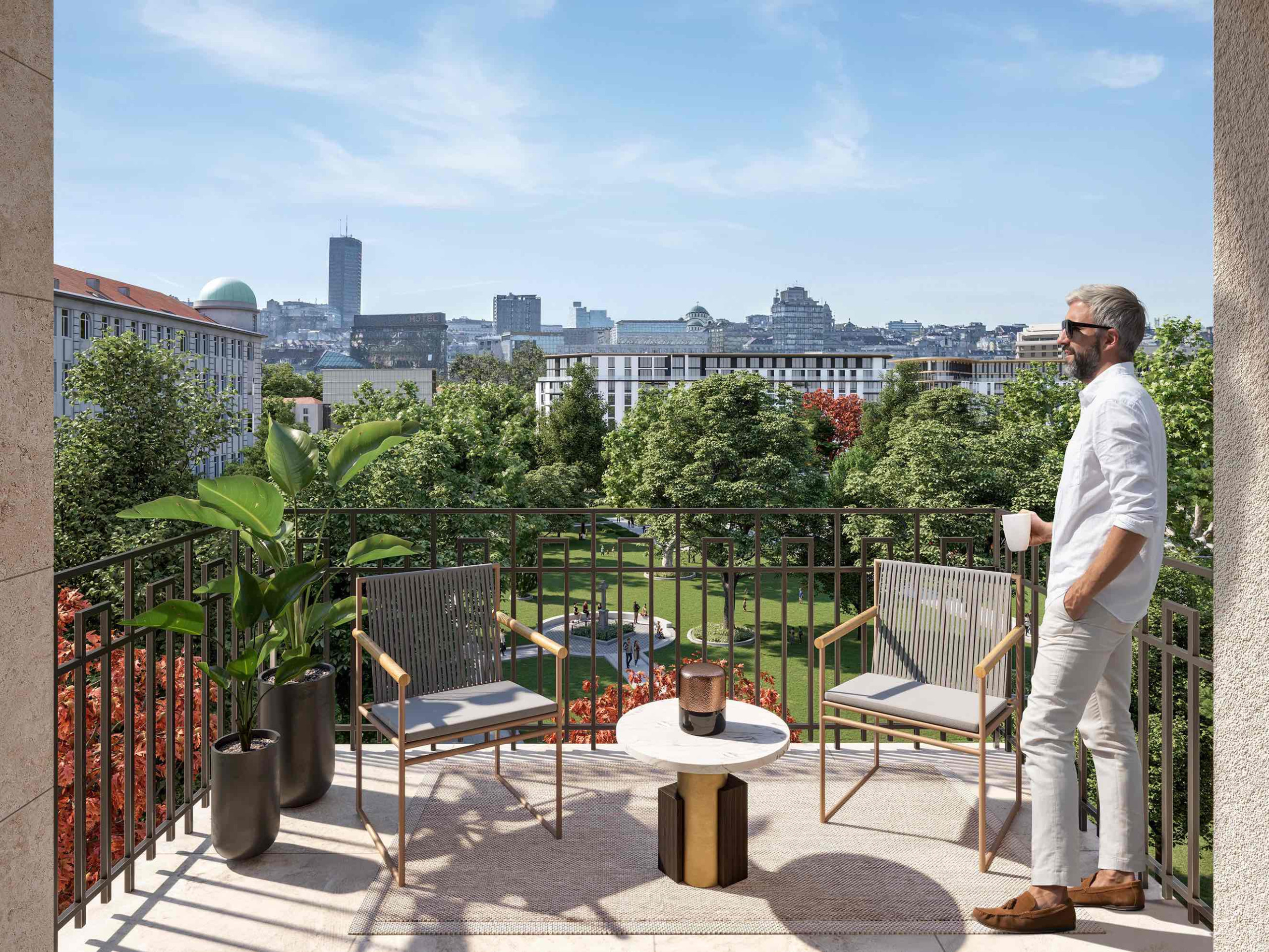 Stanovnik zgrade BW Residences opušta se na svojoj terasi, uživajući u predivnom pogledu na Bristol park.