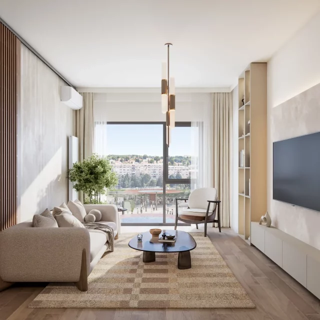 Spacious living room in the BW Neon building, illuminated by natural light.