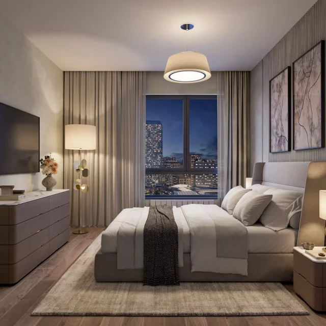 Komforna spavaća soba sa visokim prozorima u zgradi BW Lena.