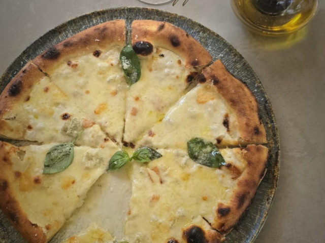 Pizza Quattro formaggi in the Italian restaurant Pistachio, in Belgrade Waterfront.