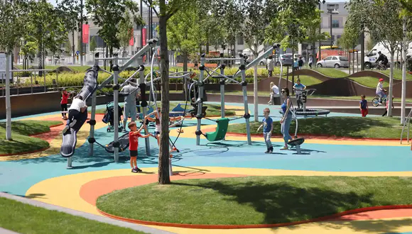 savski-park-deca_ Children playing at the playground in Sava Park.